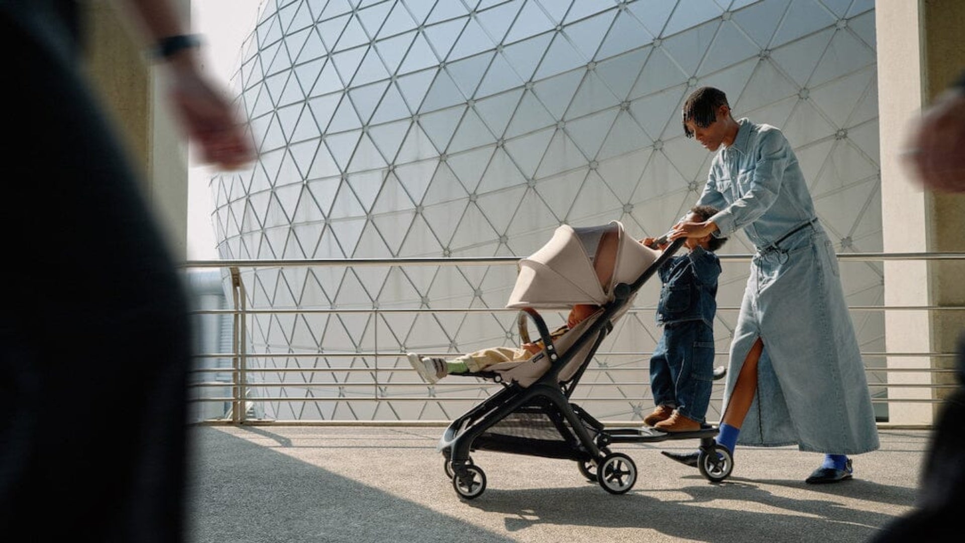 Bugaboo Butterfly with toddler on ride-on-board
